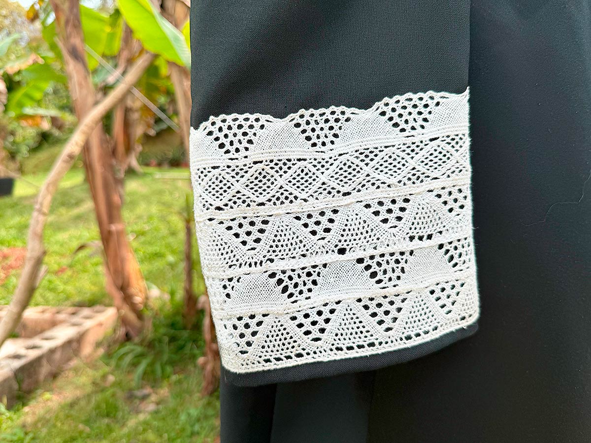 A judge' robe sleeves with bobbin lace from Moca, Puerto Rico.