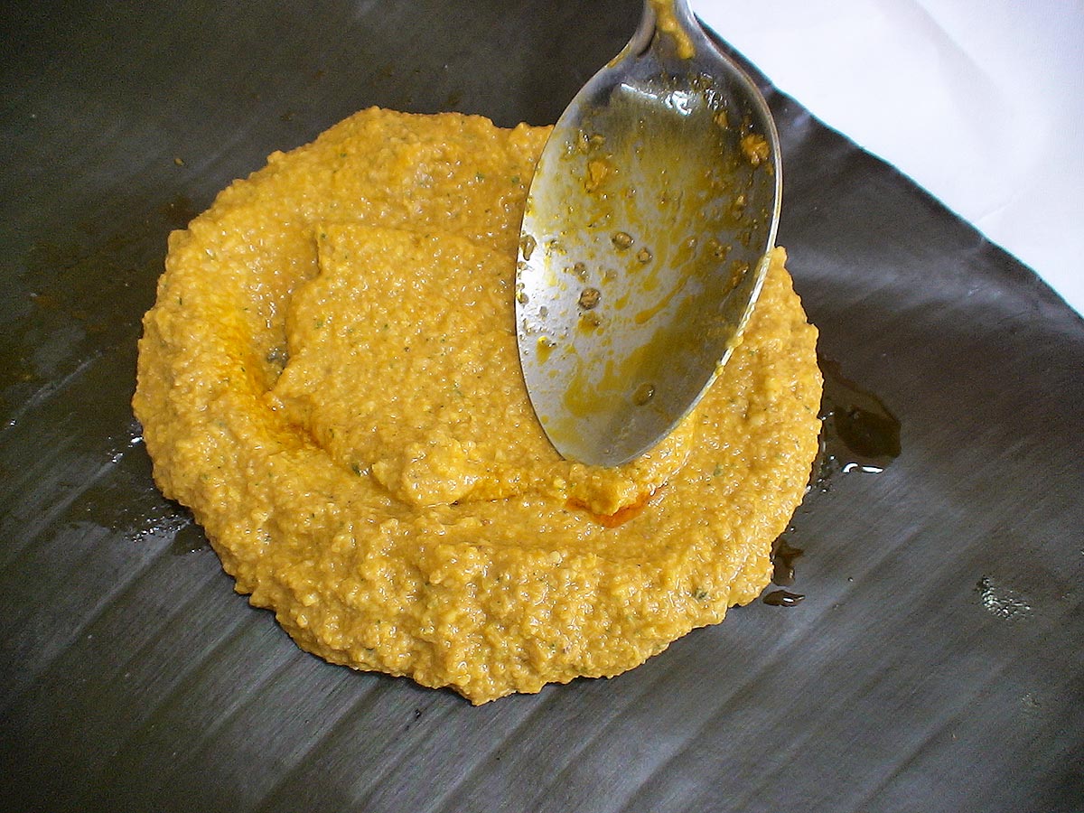Pasteles dough on a green leaf