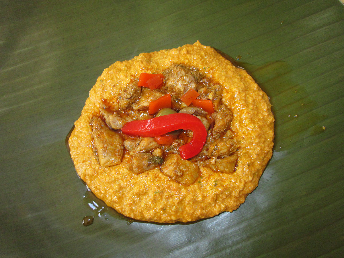 Add Spanish style red pepper to the pasteles dough