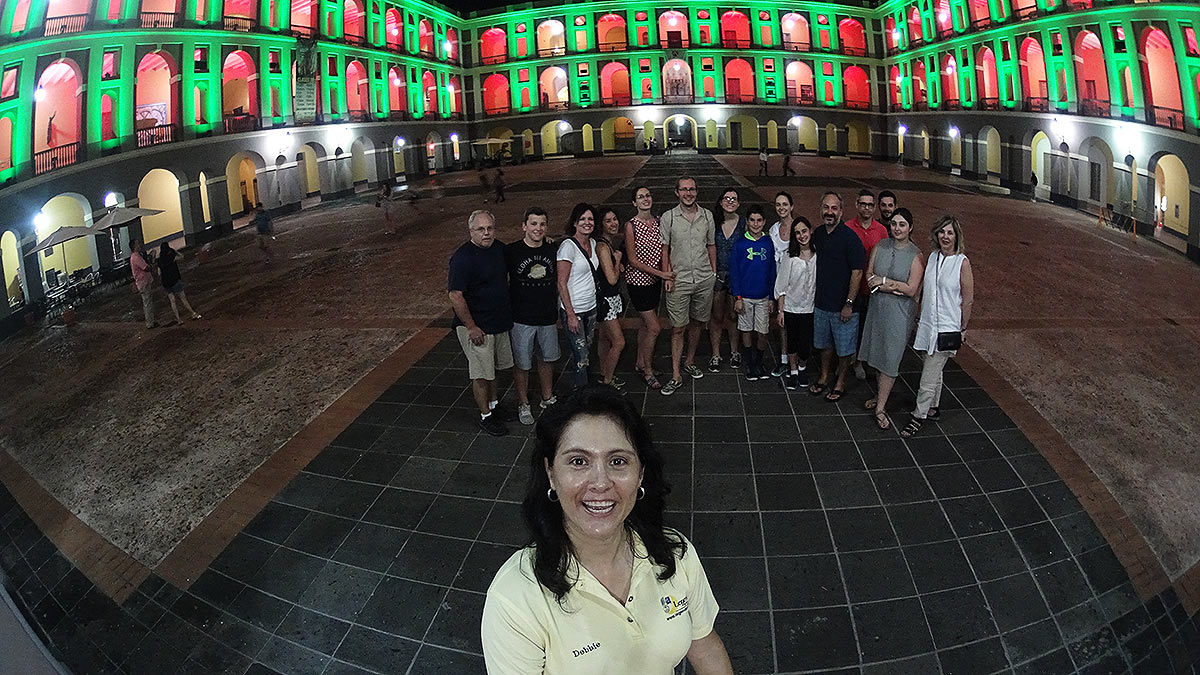 image/Cruise passengers exploring Old San Juan at night with Tour Guide Debbie